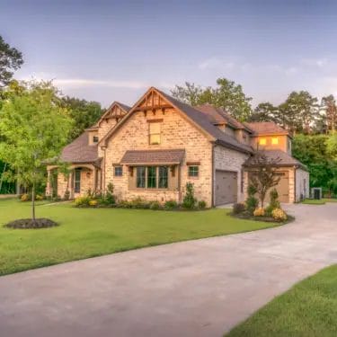 a house with trees in the background